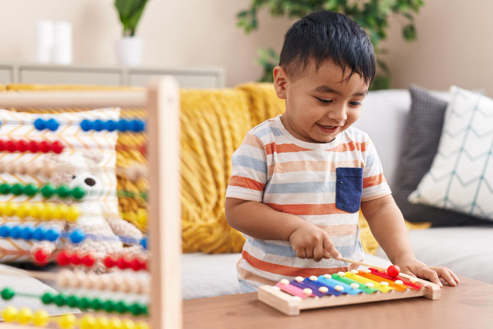 Child playing with 8-Note Wooden Musical Xylophone